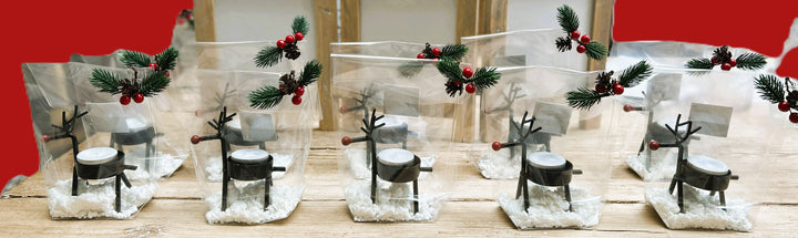 Elch aus Holz mit Umschlag